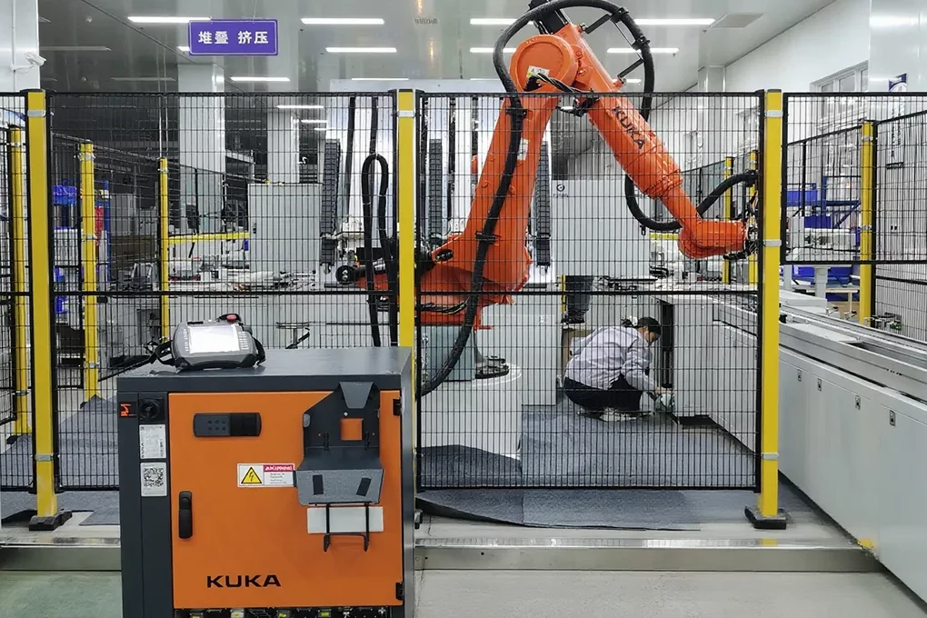 Automated production equipment inside the same-site energy storage manufacturing facility