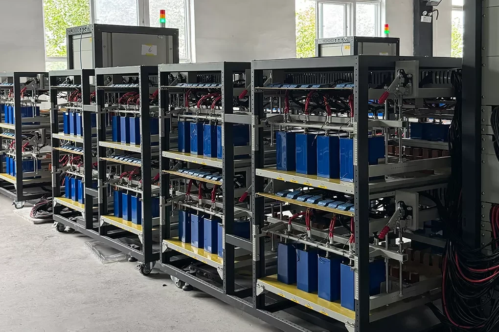 Battery module racks prepared for integration and electrical testing